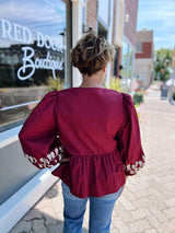 Front Bow Tie Embroidered Peplum Top