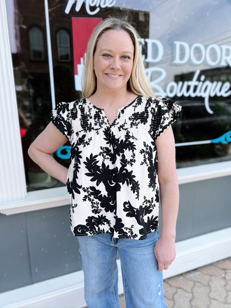 Floral Printed Top with Wave Trim and Smocking Details