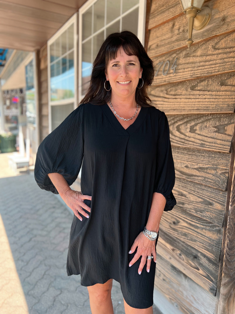 Black v-neck balloon sleeve dress