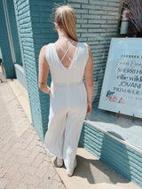White Sleeveless Surplice Jumpsuit