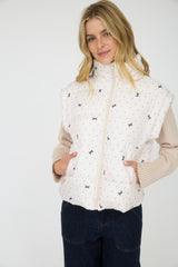 Ivory Polka Dot and Bow Pattern Zip Up Puffer Vest