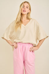 Cream Exposed Seam Textured V Neck Top