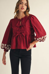 Front Bow Tie Embroidered Peplum Top