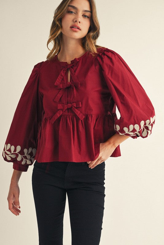 Front Bow Tie Embroidered Peplum Top