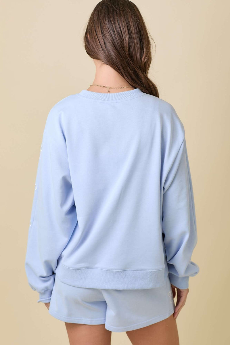 Light Blue Crewneck with Bow Embroidery Details