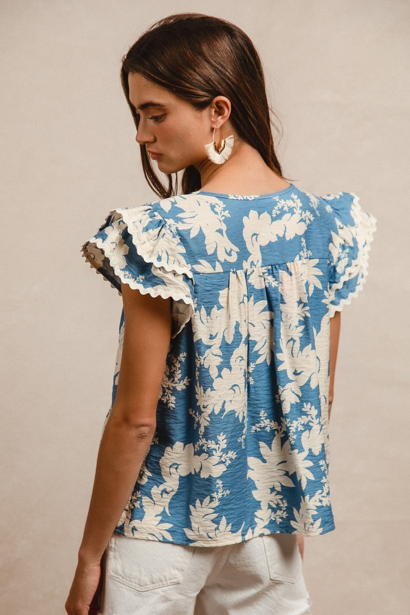 Floral Printed Top with Wave Trim and Smocking Details