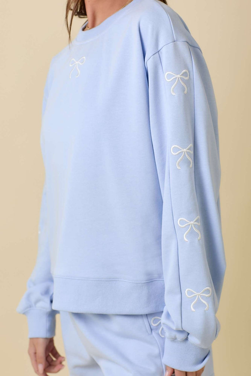 Light Blue Crewneck with Bow Embroidery Details