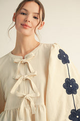 Cream Front Bow Tie Embroidered Peplum Top