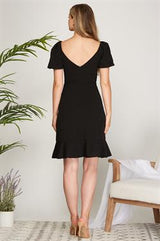 Black knit ruffle hem dress