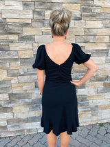 Black knit ruffle hem dress