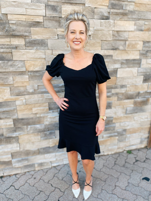 Black knit ruffle hem dress