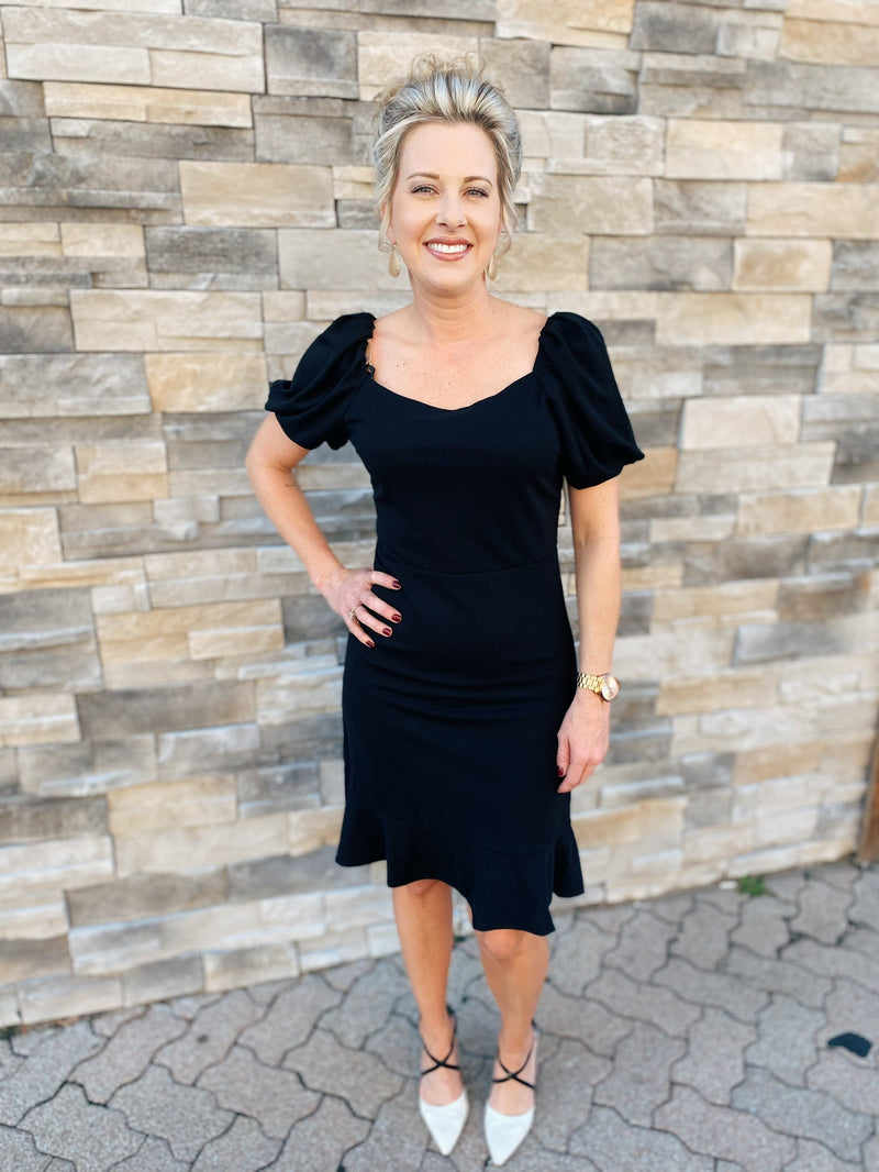 Black knit ruffle hem dress