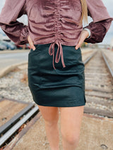 Faux leather skirt with pockets