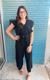 Black surplice ruffle sleeve jumpsuit