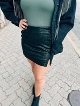 Black skirt with side buttons and slit