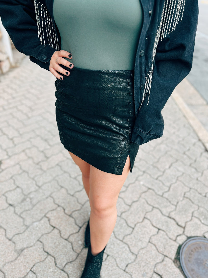 Black skirt with side buttons and slit